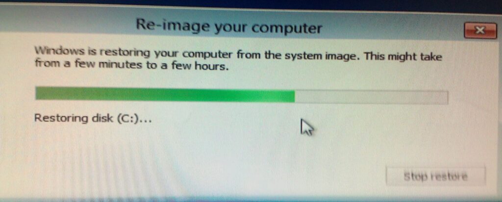 Windows Server Backup 2012 restore process showing external drive assignment blinking hard drives for accounting healthcare charity recovery