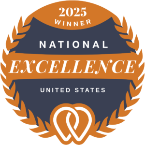 Farmhouse Networking 2025 National Excellence Badge featuring a circular gold emblem with the text ‘2025 National Excellence Winner – United States’ and the Farmhouse Networking logo, representing national recognition for outstanding IT services.